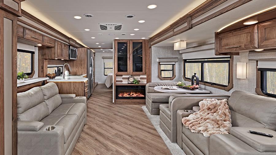 Accolade 37M Rear Interior | The Accolade 37M is warm and inviting, with vinyl plank flooring, hardwood cabinet doors and drawer fronts with deluxe hidden cabinet hinges, an 84-inch interior ceiling height with a padded vinyl ceiling and day/night roller shades in the living area. 