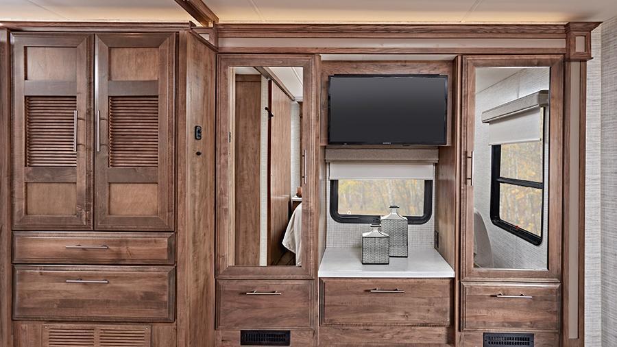 Accolade 37M Wardrobe | The wardrobes in the Accolade 37M have space for everything, while the 32-inch Smart LED TV makes unwinding in bed easy to do. 