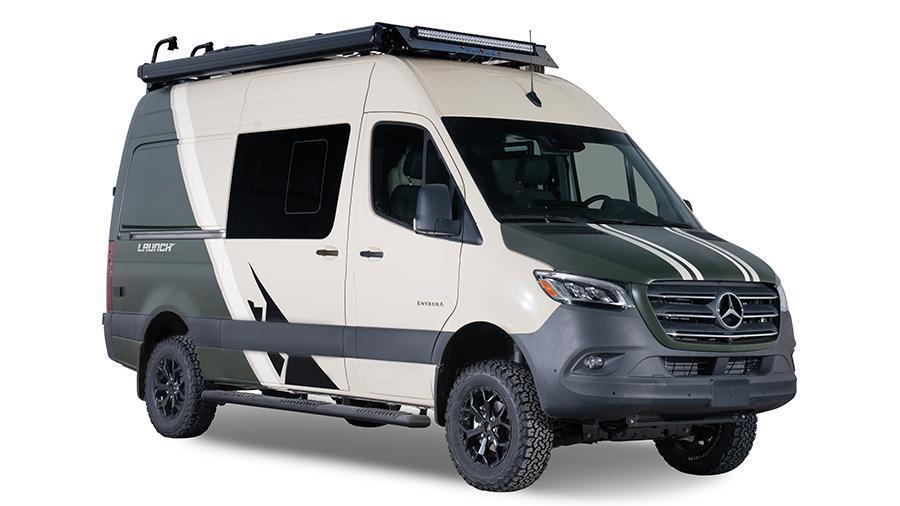Launch 19Y Exterior | Attention is given to the rugged aesthetic of the Launch 19Y with black aluminum wheels with BFGoodrich® All-Terrain T/A KO2 tires, LED-lit running boards for cab and entry doors and front and rear wind deflectors with a front LED light bar. 
