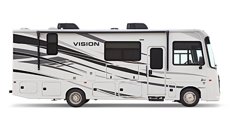 Vision Exterior Profile | The exterior of Vision features frameless windows, an electric patio awning with LED lights and slideout cover awnings, an entrance door with the industry’s largest travel-view window and electric-powered entrance steps. 