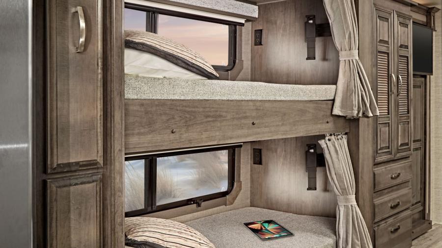 The Accolade bunks have and industry-exclusive 300-pound capacity each and wall-mounted tablet holders in each bunk.