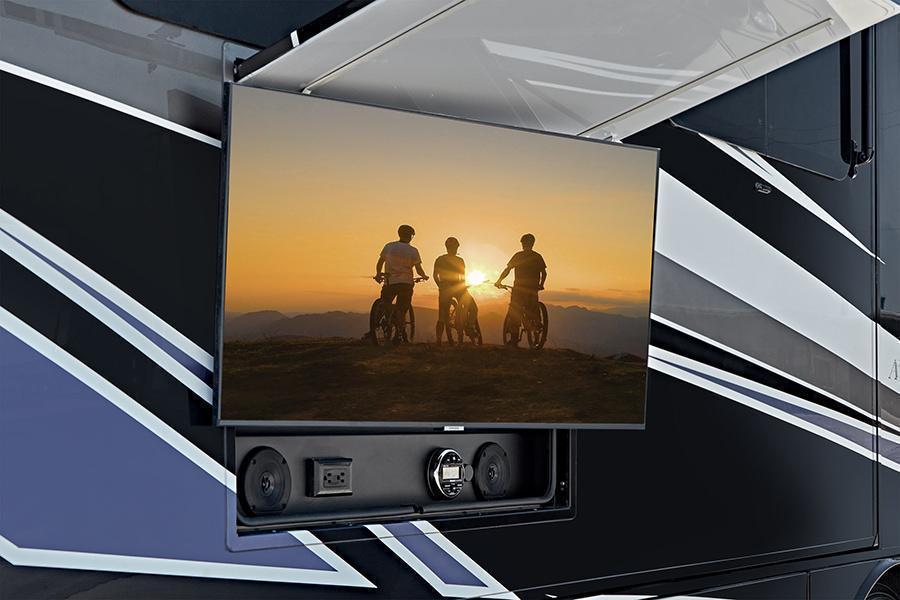 Aspire 40P Exterior Entertainment Center | The exterior entertainment center on the Aspire features a 43-inch Samsung® 4K UHD Smart TV with tilt, swivel and extended adjustment and JBL® radio and speaker with USB port and receptacle (40P Shown). 