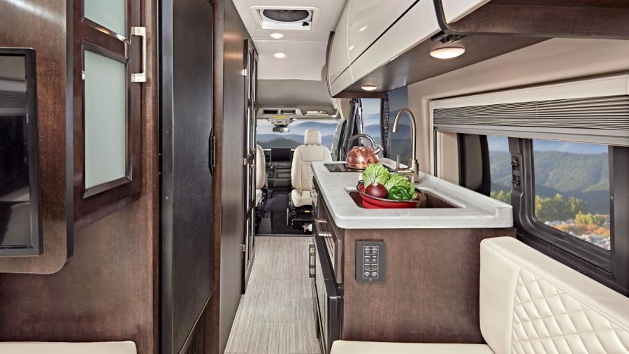 Enter into luxury in the Expanse Li. With Tecnoform European-style high-gloss cabinetry, residential vinyl flooring, sliding vented windows and high-intensity LED ceiling lights, you'll find you're living your best #vanlife.