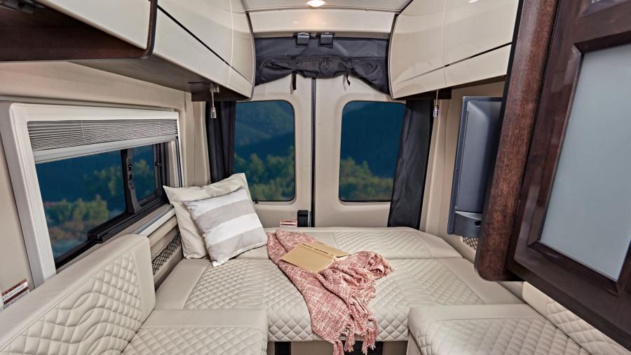 Create extra sleeping space in the Expanse when you convert the power sofa to a 68-inch by 76-inch bed. The rear screen door rolls up and has black-out capabilities for an ideal sleeping environment. 