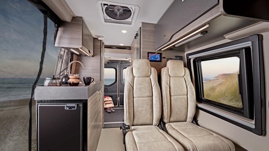 The Launch has a screen door so you can enjoy the outdoors, indoors, without the threat of bugs and other nuisances. Take it all in from the cab bucket seats with slide and recline features.