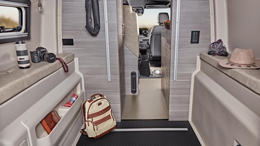 Maximizing on space, the Launch has ample rear storage with conveniently thought of built-in storage compartments atop the durable rubber mat flooring.