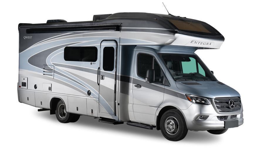 Qwest Exterior | The Qwest exterior features premium Sikkens full-body paint and one-piece, seamless fiberglass front cap with an automotive-bonded panoramic window front cap with power shade and partial fiberglass rear cap. 