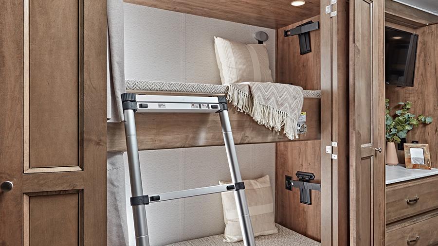 Reatta 39BH Bunks | The Reatta 39BH power bunks are a great space for the kids to curl up and sleep or enjoy some down time. The bunks have an industry-exclusive 300 lb. capacity each. 