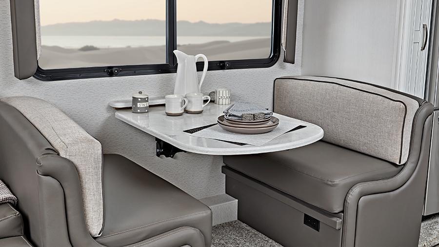 Reatta XL 40Q3 Dinette | The dinette in the Reatta XL 40Q3 is cozy seating for dining and the exclusive legless dinette table provides more leg room.  