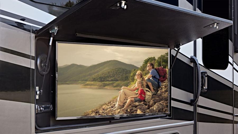 Vision Exterior Entertainment Center | The exterior entertainment center on Vision has outside speakers and an LED HD Smart TV mounted on a swivel bracket. 